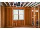 Bright bedroom showing wall studs, open ceiling, and double window at 2305 Ballywater Lea Way, Wake Forest, NC 27587