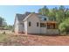 New construction exterior of a two-story home featuring a screened in porch at 2305 Ballywater Lea Way, Wake Forest, NC 27587