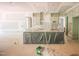 Unfinished kitchen with a large island, custom cabinets, and open layout awaiting final touches at 2305 Ballywater Lea Way, Wake Forest, NC 27587