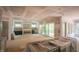 Large unfinished living area with open access to a porch area and a fireplace at 2305 Ballywater Lea Way, Wake Forest, NC 27587