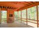 Screened in porch showcasing wooden beams and natural light at 2305 Ballywater Lea Way, Wake Forest, NC 27587