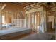 Framed room construction highlighting wooden support beams and window at 2305 Ballywater Lea Way, Wake Forest, NC 27587