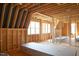 Framed room construction featuring windows and wooden support beams at 2305 Ballywater Lea Way, Wake Forest, NC 27587