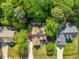 Aerial view of the home's roof, driveway and mature landscape at 262 Windgate Dr, Clayton, NC 27527