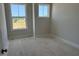 A bedroom with natural light and neutral tones at 3022 White Rail Dr, Fuquay Varina, NC 27526