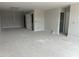 Spacious bonus room with multiple doors and a neutral color palette at 3022 White Rail Dr, Fuquay Varina, NC 27526