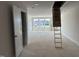 Bright and spacious bonus room or loft with large windows and easy attic access at 3022 White Rail Dr, Fuquay Varina, NC 27526