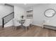 Chic dining room with modern decor, stylish chairs, and a glass-topped table at 3022 White Rail Dr, Fuquay Varina, NC 27526