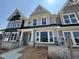 New construction townhome featuring modern architectural design and beautiful curb appeal at 3022 White Rail Dr, Fuquay Varina, NC 27526