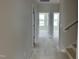 A long hallway leading to two bedrooms at 3022 White Rail Dr, Fuquay Varina, NC 27526