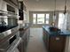 The kitchen features a spacious layout, modern appliances and finishes at 3022 White Rail Dr, Fuquay Varina, NC 27526