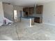 Unfinished kitchen featuring cabinets, an island, and a staircase at 3022 White Rail Dr, Fuquay Varina, NC 27526