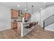 Well-equipped kitchen with stainless steel appliances and a center island with bar seating at 3022 White Rail Dr, Fuquay Varina, NC 27526