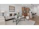 Cozy living room with stylish furniture and decor, open to the kitchen at 3022 White Rail Dr, Fuquay Varina, NC 27526