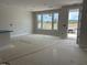 Unfinished living room with ample natural light and an unfinished floor at 3022 White Rail Dr, Fuquay Varina, NC 27526