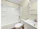 Clean and well-maintained bathroom with a shower-tub combo, a modern vanity, and neutral tones at 304 Cedarwood Ln, Carrboro, NC 27510