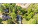 Beautiful house seen from above, surrounded by trees and green spaces, creating a serene environment at 308 Thorndale Dr, Dunn, NC 28334