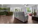 Inviting living room featuring a spacious seating area, natural light, and hardwood floors, creating a warm atmosphere at 308 Thorndale Dr, Dunn, NC 28334