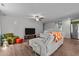 Living room showcasing neutral walls, wooden floors, modern furniture, and decor promoting comfortable living space at 308 Thorndale Dr, Dunn, NC 28334