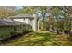 Expansive backyard with lush lawn leading to scenic views and patio seating area at 373 & 375 Sagamore Dr, Louisburg, NC 27549