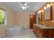 Bathroom features a soaking tub and double vanity at 373 & 375 Sagamore Dr, Louisburg, NC 27549