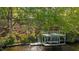 Private boat dock on the waterfront, equipped with boat storage and a sun deck at 373 & 375 Sagamore Dr, Louisburg, NC 27549