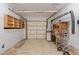 A functional garage featuring an overhead track and storage solutions, ideal for organizing tools and equipment at 373 & 375 Sagamore Dr, Louisburg, NC 27549