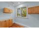 Office with natural light from the window, beautiful view, and cabinets for storage at 373 & 375 Sagamore Dr, Louisburg, NC 27549