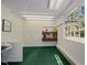 Office with built-in desk and storage, natural light and carpet flooring at 373 & 375 Sagamore Dr, Louisburg, NC 27549