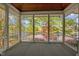 Inviting screened-in porch showcasing scenic lake views and surrounding greenery, perfect for relaxation at 373 & 375 Sagamore Dr, Louisburg, NC 27549