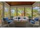 Cozy porch with lake view, outdoor furniture and lots of natural light at 373 & 375 Sagamore Dr, Louisburg, NC 27549