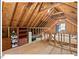 Spacious attic storage area with wood framing and open rafters, ready for customization at 4 N Poston Ct, Durham, NC 27705