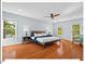 Spacious main bedroom filled with natural light and features hardwood floors at 4 N Poston Ct, Durham, NC 27705