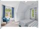 Bright bedroom featuring a charming window nook, and soothing color palette at 4 N Poston Ct, Durham, NC 27705