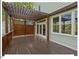Covered wooden back deck with lattice, offering privacy and an enjoyable outdoor living space at 4 N Poston Ct, Durham, NC 27705