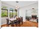 Dining room featuring natural light and view into an adjacent sitting room at 4 N Poston Ct, Durham, NC 27705