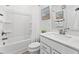 Bright bathroom featuring a white vanity, toilet, and tub with shower at 404 Gaston Park Ln # 100, Wake Forest, NC 27587