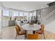 Bright living and dining area showcasing the stylish interior and modern staircase at 404 Gaston Park Ln # 100, Wake Forest, NC 27587
