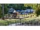 Community park featuring a playground, splash park, picnic tables and seating areas for residents at 404 Gaston Park Ln # 100, Wake Forest, NC 27587