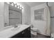 This beautifully updated bathroom boasts new vanity, fixtures and fixtures at 410 Long Ave, Roxboro, NC 27573
