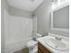 Bathroom featuring a tub and a single sink vanity at 413 Weeping Willow Dr, Durham, NC 27704
