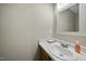 Cozy half-bathroom with a stylish vanity and a modern mirror at 413 Weeping Willow Dr, Durham, NC 27704