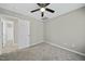 Bedroom with a view of the hallway and neutral colored walls at 413 Weeping Willow Dr, Durham, NC 27704