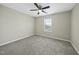 Bedroom with ceiling fan and a bright window with natural light at 413 Weeping Willow Dr, Durham, NC 27704