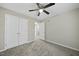 Bedroom view showcases closet, doorway and soft carpet at 413 Weeping Willow Dr, Durham, NC 27704