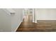 Inviting hallway with beautiful flooring leads to sunlit rooms at 413 Weeping Willow Dr, Durham, NC 27704