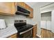 Modern kitchen features stainless steel appliances and marble countertops at 413 Weeping Willow Dr, Durham, NC 27704