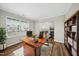 Elegant office space with hardwood floors, a large window, and custom built-ins at 413 Weeping Willow Dr, Durham, NC 27704