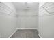 Large walk-in closet with ample wire shelving for storage at 413 Weeping Willow Dr, Durham, NC 27704