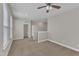 Open bonus room with carpet flooring, ceiling fan and neutral walls at 4252 Rockdell Hall St, Raleigh, NC 27616